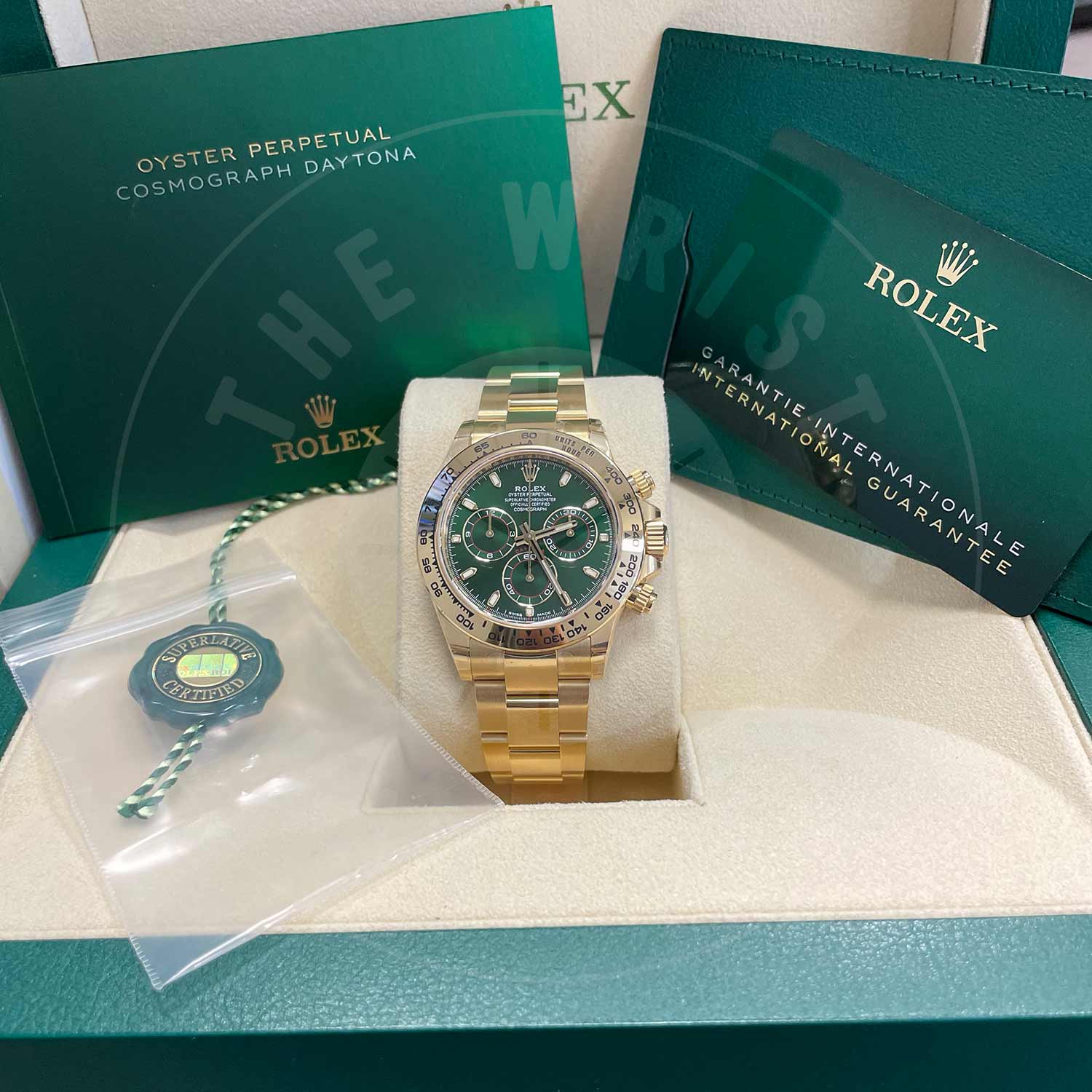 Rolex Daytona 116508 18ct Yellow Gold Green w/Red Accents